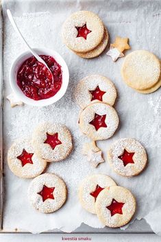 cookies and jam are arranged on a baking sheet