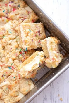 cake batter with sprinkles in a metal pan