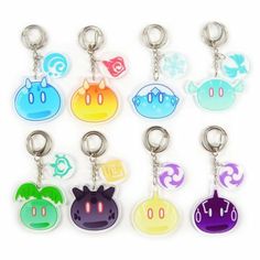 six key chains with different colored cartoon characters on them, all in various shapes and sizes