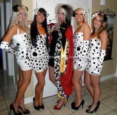 four women dressed up in dalmatian costumes