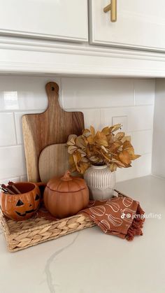 a wooden cutting board sitting on top of a counter