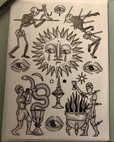 a drawing on paper with various symbols and people in the background, including an eye