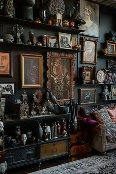 a living room filled with lots of different types of art on the walls and shelves