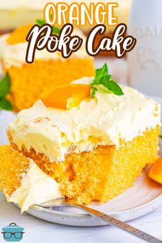 a piece of orange poke cake on a plate