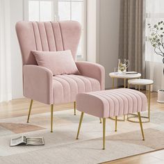 a pink chair and ottoman in a living room