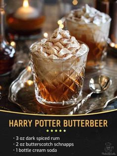 the harry potter butterbeeer is served in two glasses with whipped cream on top