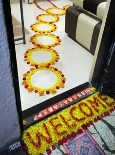 a long line of flowers on the floor