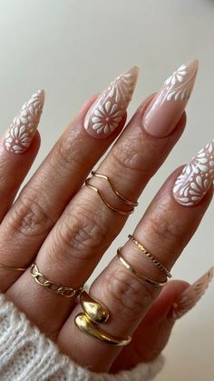 Natural Looking Nails With Design, Floral Nails Nude Base, White Abstract Nail Designs, La Inspired Nails, White November Nails, Almond Shaped Gel X Nails, White Nails With White Designs, Tan Almond Nails With Design, White October Nails