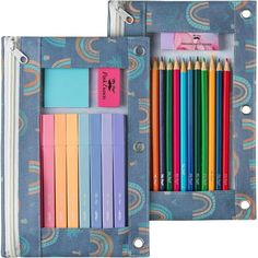 a pencil case with several colored pencils in it and a notepad inside the box