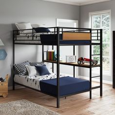 a bunk bed in a child's bedroom next to a dresser