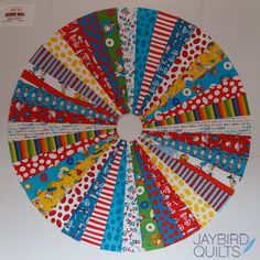 a colorful paper circle with different patterns on it