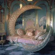 an elaborately decorated bed in the middle of a room with blue walls and flooring