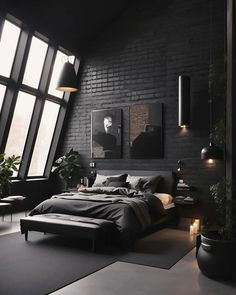 a bedroom with black brick walls and large windows