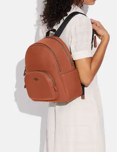 Refined pebble leatherInside zip and slip pocketsZip closure, fabric liningHandle with 2 1/4" dropOutside zip pocketAdjustable shoulder straps10 1/2" (L) x 14 1/4" (H) x 5" (W)Style No. 5666Color: Sunset St Helena, Leather Backpack, Fashion Backpack, Backpacks, Leather, Fabric