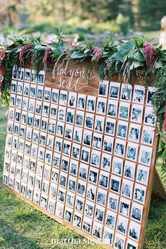 the table is set up with photos and flowers