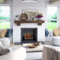 a living room filled with furniture and a fire place in the middle of the room