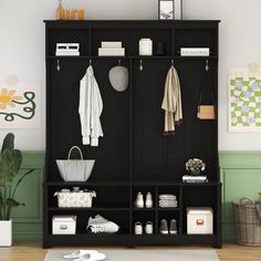 a black and white coat rack in a living room