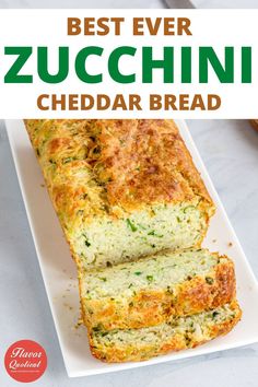 the best ever zucchini cheddar bread on a white plate