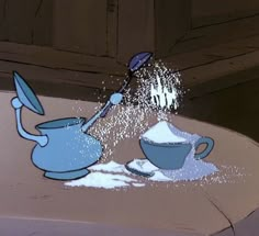 an animated image of two teapots with sugar pouring out of them on a table