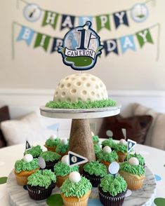 a golf themed birthday cake and cupcakes