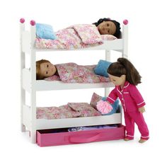 two dolls standing next to each other on top of bunk beds with pink sheets and pillows