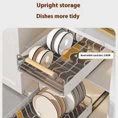 an open drawer with dishes in it and the words, upright storage dishes more tidy