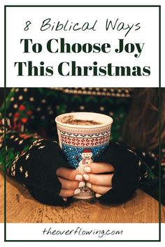 a woman holding a cup with the words 8 biblical ways to choose joy this christmas