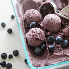 a scoop of ice cream with blueberries in it