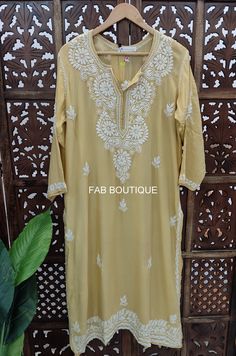 ▪ Kurti Fabric: Modal ▪ Kurti Length: 44-46 Inches ▪ Sleeves: 3/4 Sleeves ▪ Style: Straight Kurti ▪ Occasions: Party Wear, Office Wear, Festive Wear ▪ Garment Care: Hand Wash Only ▪ Price Includes: 1x Kurti Bohemian Long Salwar Kameez For Wedding, Traditional Fitted Kurta For Festivals, Semi-stitched Bollywood Style Kurta For Festival, Long Embroidered Churidar For Festivals, Bollywood Style Semi-stitched Kurta For Festivals, Bollywood Semi-stitched Kurta For Festivals, Traditional Festival Kurta With Zari Work, Bohemian Chikankari Embroidery Sets For Festivals, Bohemian Cutdana Salwar Kameez For Festivals