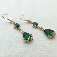 Green Crystal Earrings Green Rhinestone Earrings Green and Gold Earrings Irish Earrings Vintage Inspired Earrings Irish Jewelry Wedding Earrings Formal Earrings Wedding Jewelry St. Patrick's Earrings Handmade Earrings Gift for Her Gift for Mom Cherished design Green Crystal Glass Rhinestone Teardrop Dangle Earrings handmade by me. DETAILS OF THE EARRINGS: *Gold Brass Green Crystal Glass with White Cubic Zirconia Rhinestone Charm Pendants  *Gold Brass Green Crystal Teardrop Charm Pendants with Go Green Vintage Earrings, Earrings Formal, Irish Earrings, Formal Earrings, Vintage Inspired Earrings, Pendants Gold, Stylish Earrings, Irish Jewelry, Teardrop Dangle Earrings