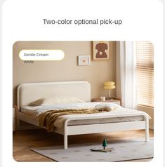 a white bed sitting on top of a wooden floor