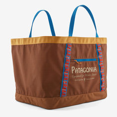 a brown and blue bag with the words pataconia on it