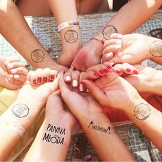 a group of people holding their hands together in a circle with the words panna meda written on them