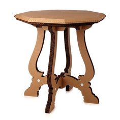 a wooden table with an intricate design on the top and bottom, sitting against a white background