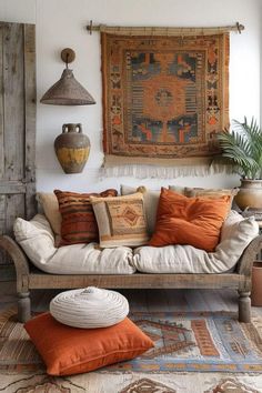 a living room filled with furniture and pillows