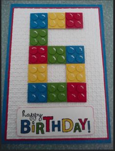 a birthday card made with lego blocks and the number one on it's side