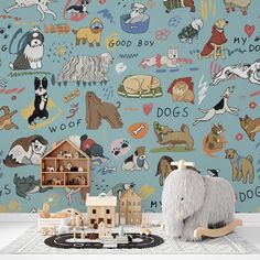 an animal themed children's room with toys and wallpaper