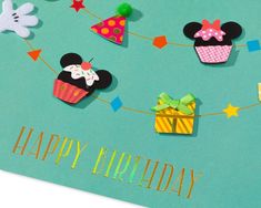 a birthday card with mickey and minnie mouse decorations