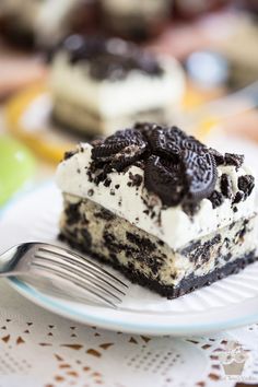 a piece of ice cream cake on a plate with a fork