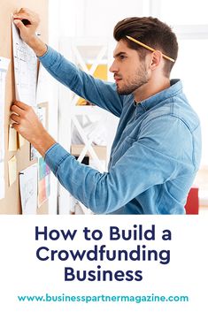 a man writing on a bulletin board with the words how to build a crowdfunding business