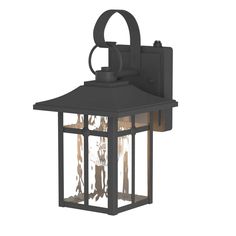 an outdoor wall light with a lantern on the front and side panels, in black