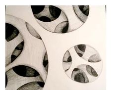 three black and white circles are shown in this drawing