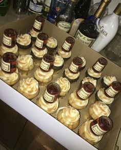 cupcakes in a box with jam on them