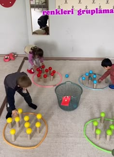 two children playing with toys on the floor