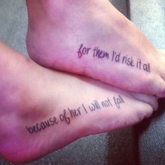 two feet with words written on them and one saying for them i'd rise it all