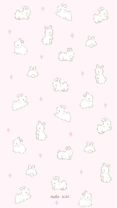 a pink background with white rabbits on it