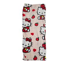 hello kitty leggings with apples and hearts on them