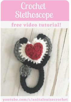 the crochet stethoscope is made with yarn and has a heart on it