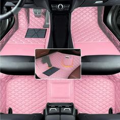 the interior of a car with pink carpet