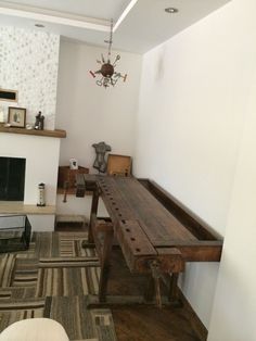 a living room filled with furniture and a fire place